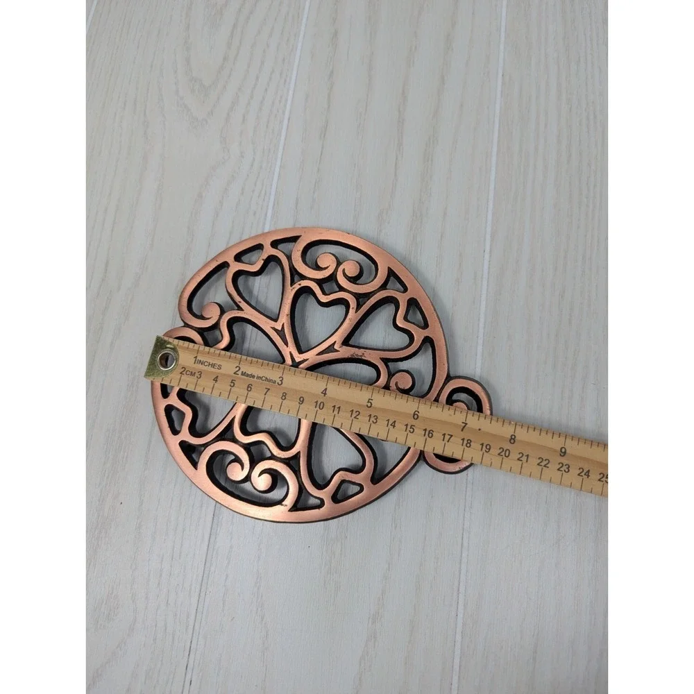Pampered Chef 2007 copper metal trivet hearts scrolls